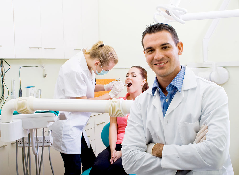 friendly dentist in office
