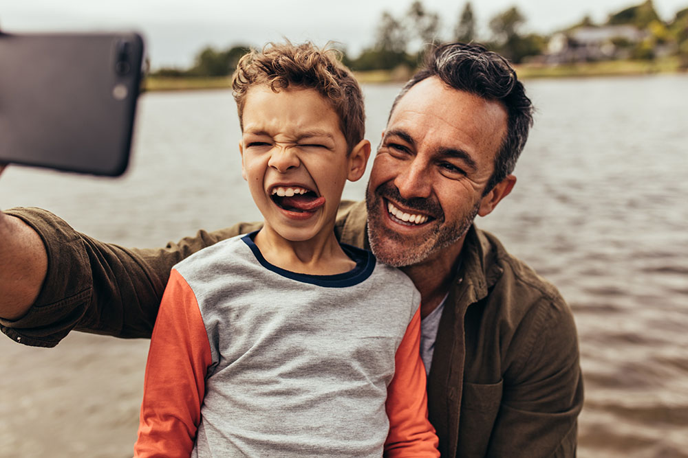 father-son-selfie-by-the-water
